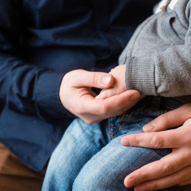 Parent and Child Holding Hands