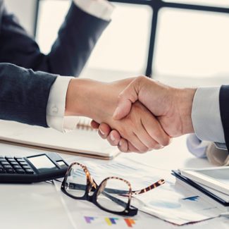 Lawyer and Client Shaking Hands