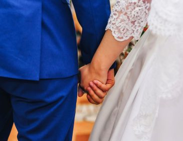 Newlywed Holding Hands